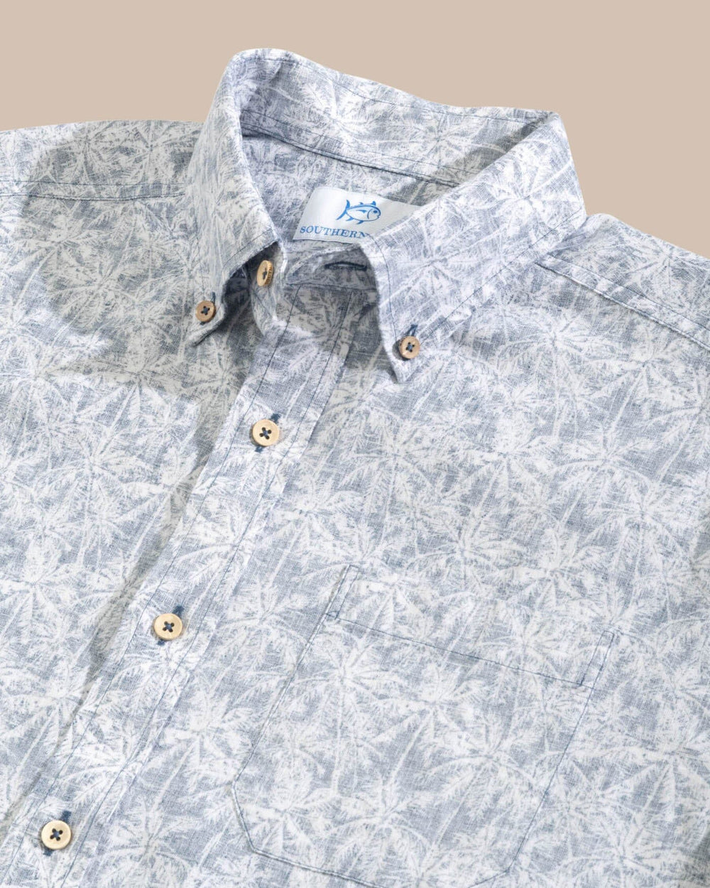The detail view of the Southern Tide Linen Rayon Keep Palm and Carry On Print Sport Shirt by Southern Tide - Aged Denim