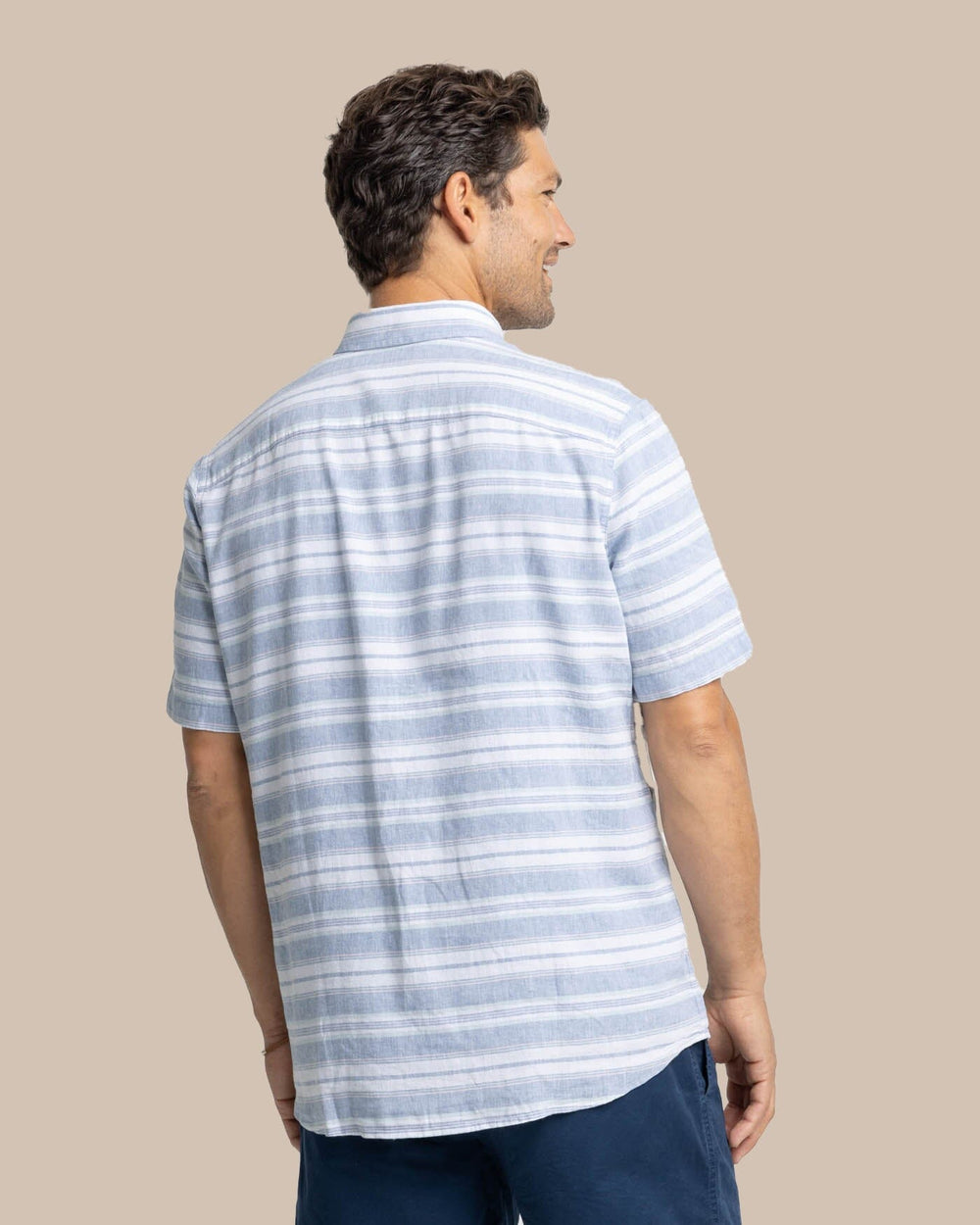 The back view of the Southern Tide Linen Rayon Timmonsok Stripe Short Sleeve Sport Shirt by Southern Tide - Coronet Blue