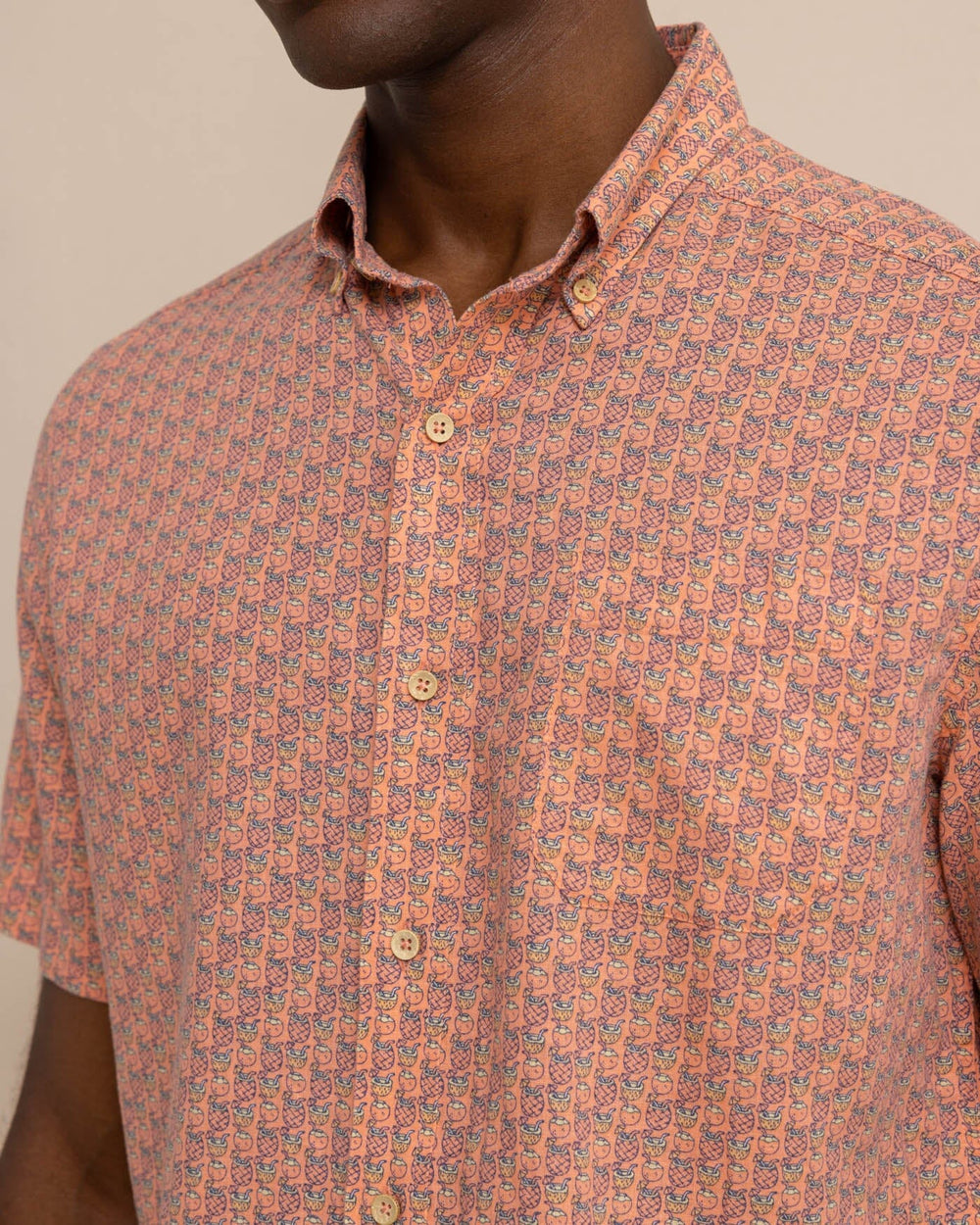 The detail view of the Southern Tide Linen Rayon Vacation Views Short Sleeve SportShirt by Southern Tide - Desert Flower Coral