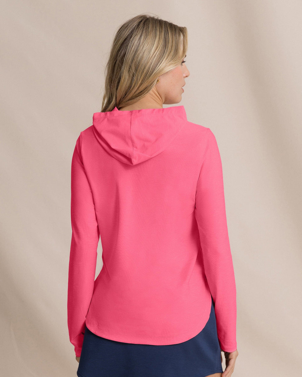 The back view of the Southern Tide Linley Coastal Breeze® Performance Hoodie by Southern Tide - Island Pink