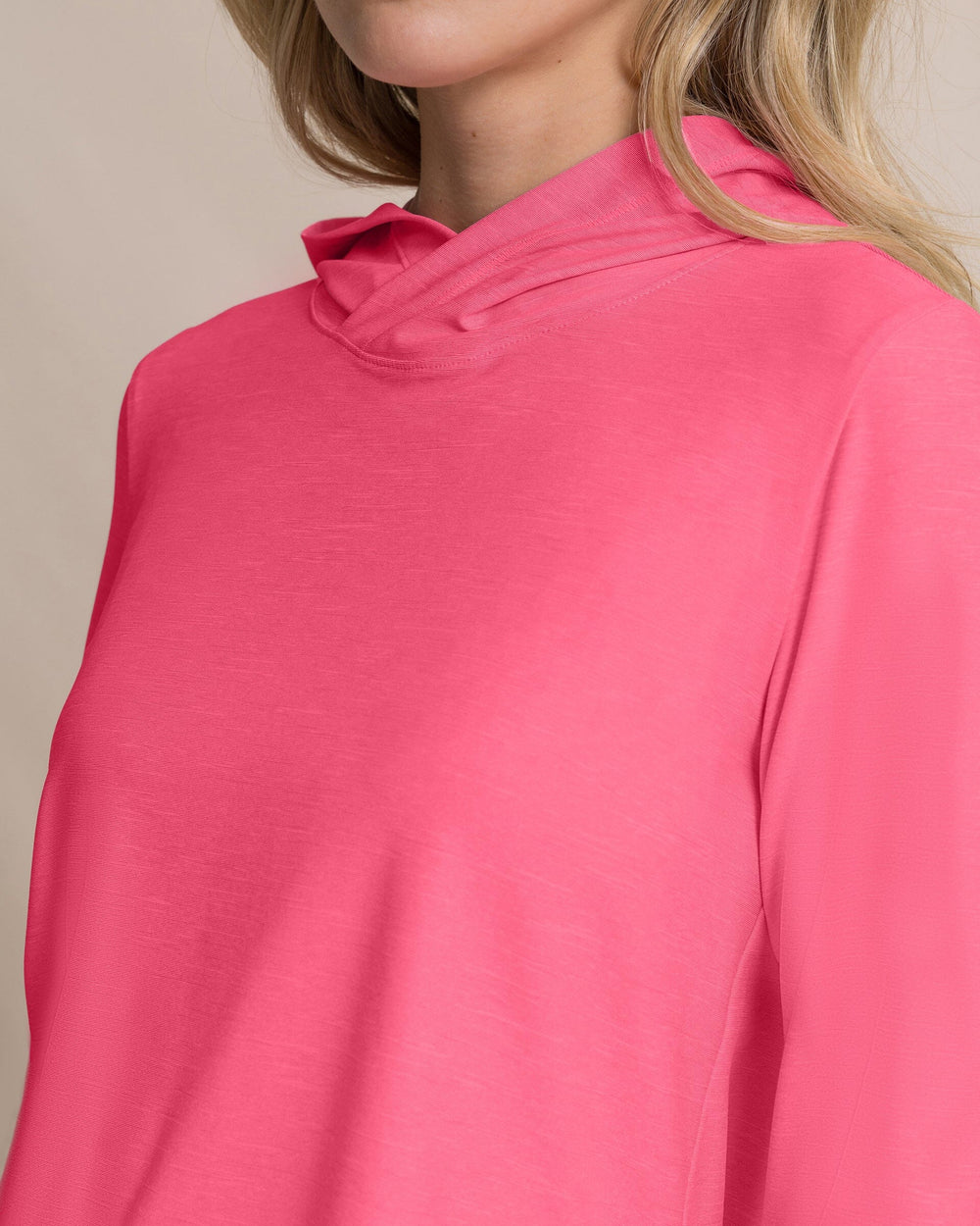 The detail view of the Southern Tide Linley Coastal Breeze® Performance Hoodie by Southern Tide - Island Pink