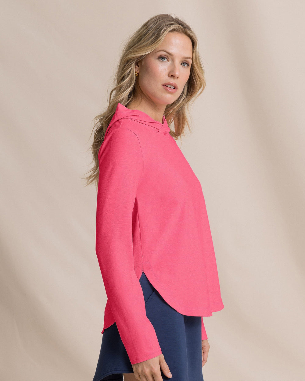 The side view of the Southern Tide Linley Coastal Breeze® Performance Hoodie by Southern Tide - Island Pink