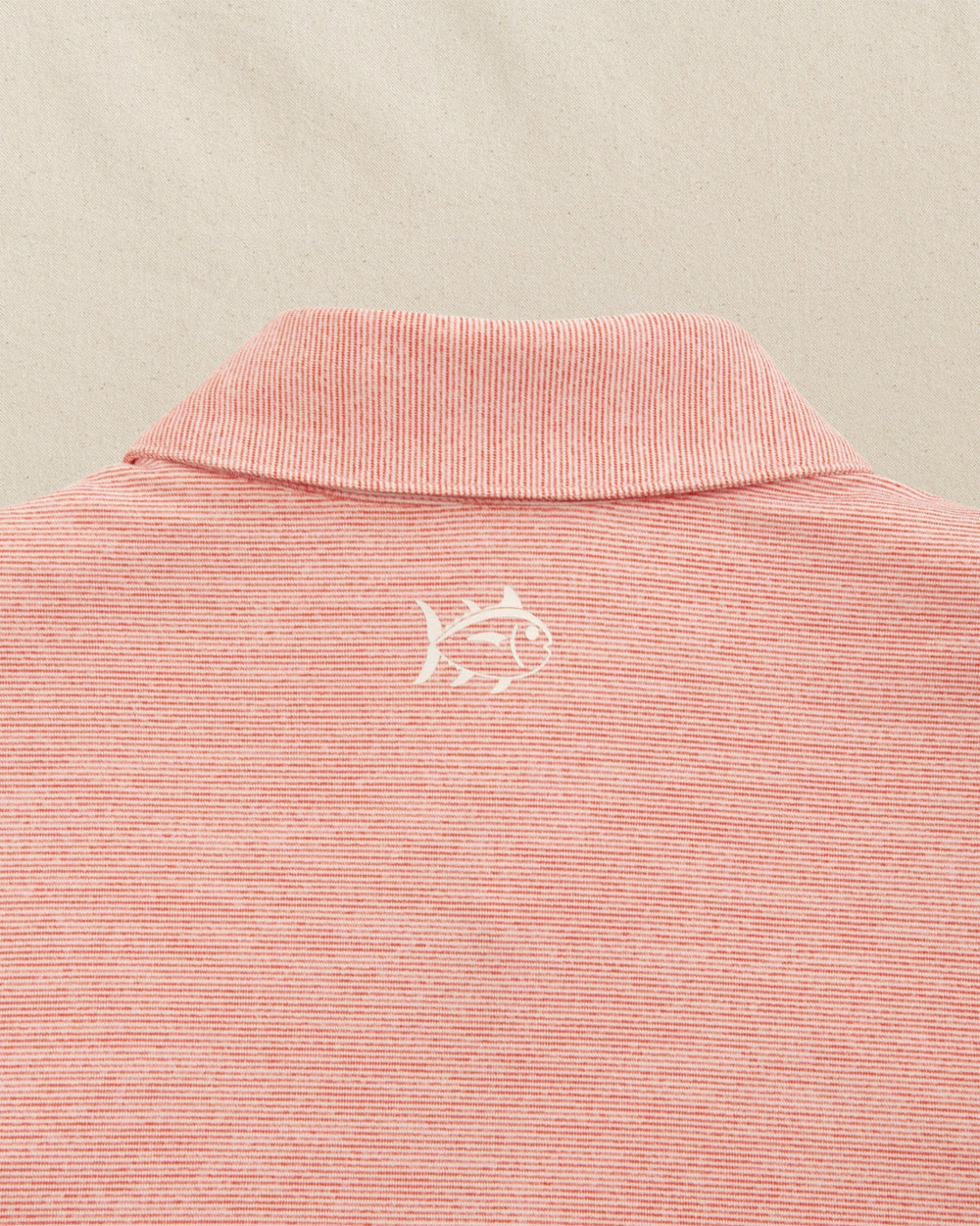 The yoke view of the Southern Tide Louisville Cardinals Driver Spacedye Polo by Southern Tide - Varsity Red