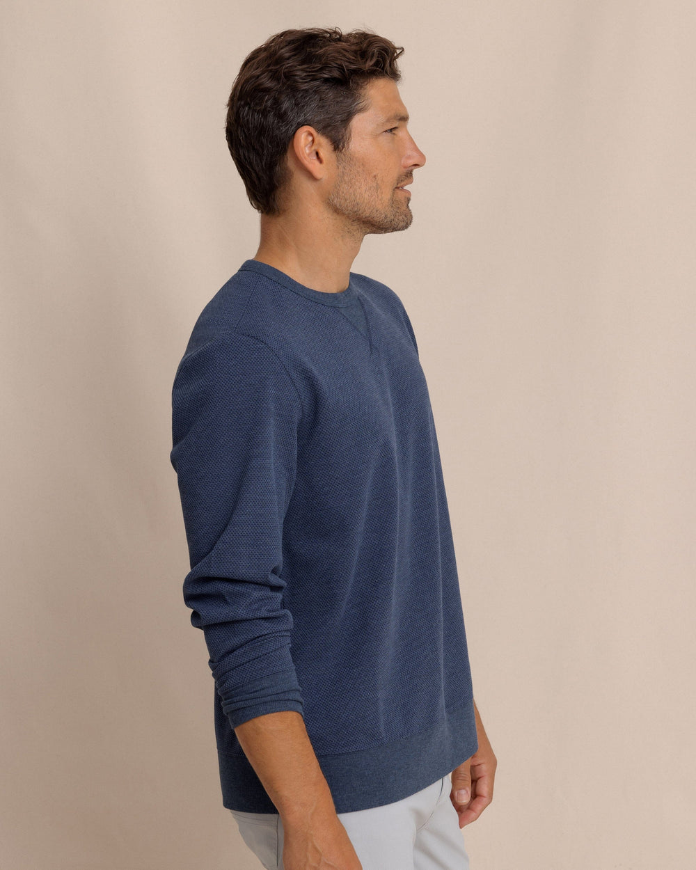 The side view of the Southern Tide Lowland Luxe Textured Crew by Southern Tide - Dark Navy