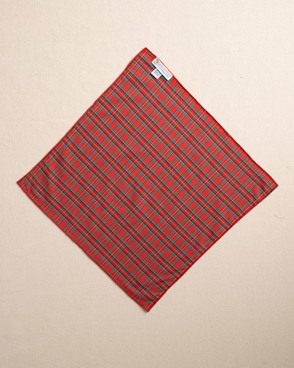 The back view of the High Cotton MacIntosh Tartan Pocket Square at Southern Tide - Red
