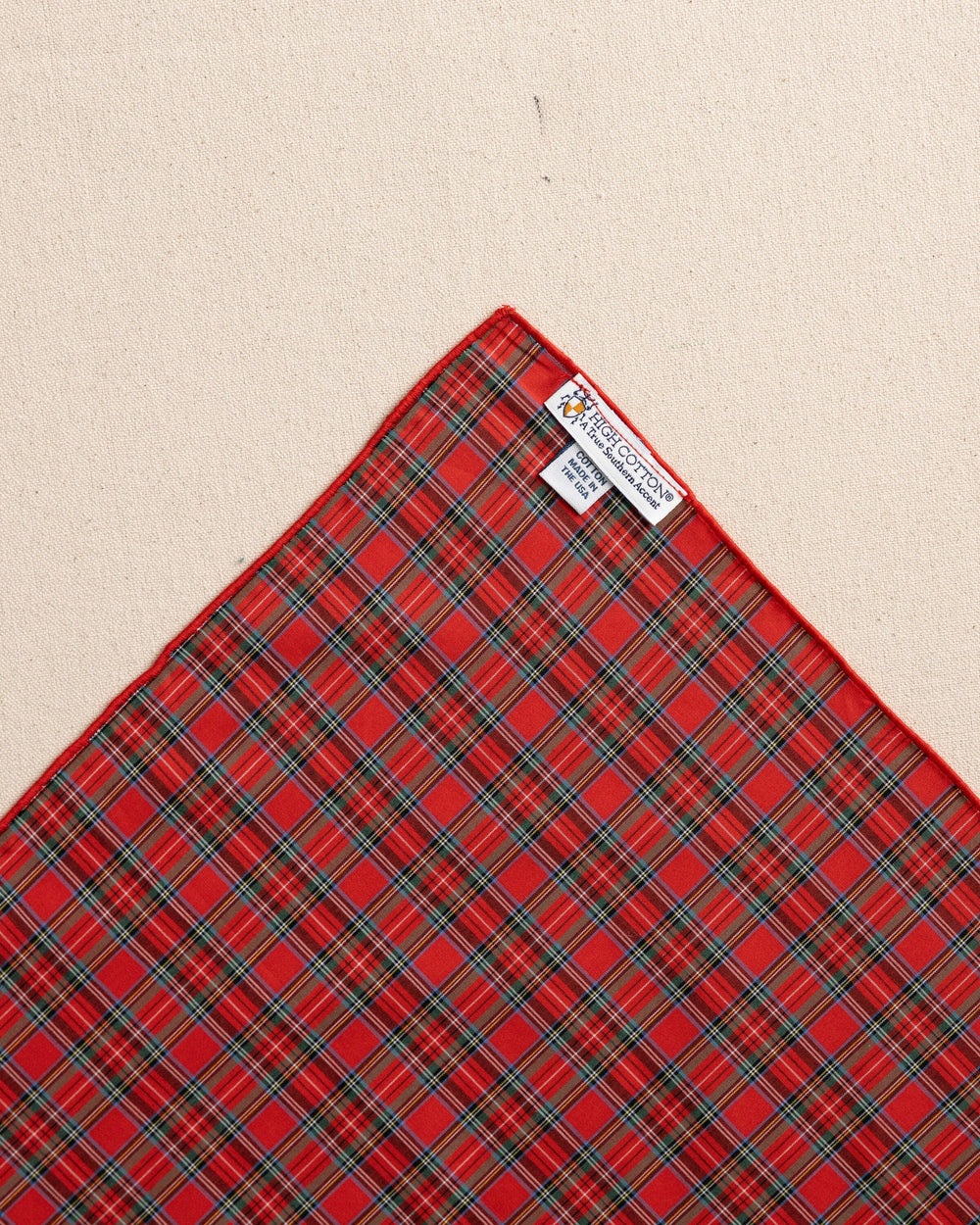 The back detail view of the High Cotton MacIntosh Tartan Pocket Square at Southern Tide - Red
