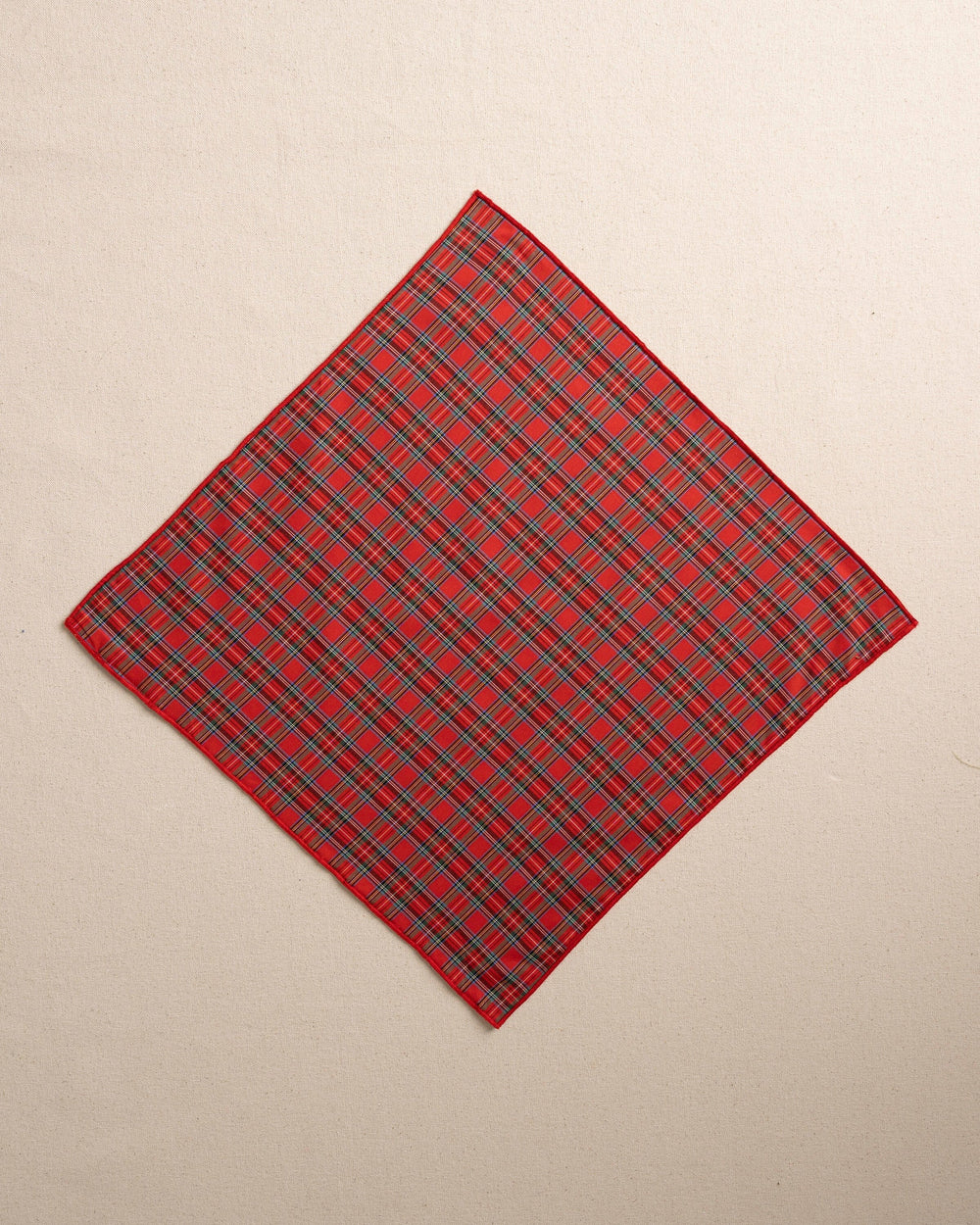 The front view of the High Cotton MacIntosh Tartan Pocket Square at Southern Tide - Red