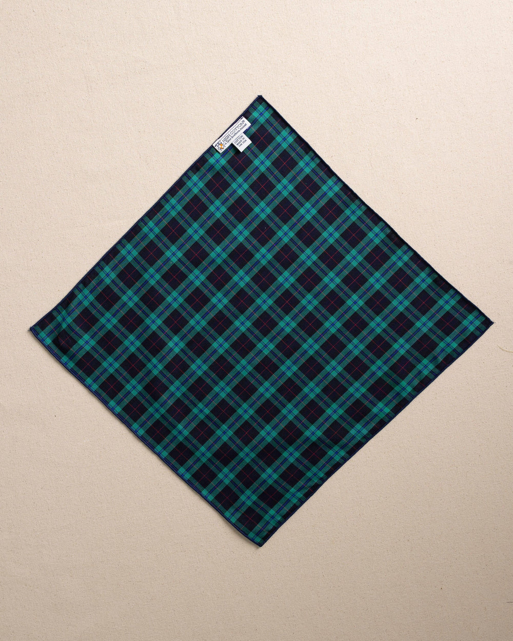 The back view of the High Cotton Macleod Tartan Pocket Square at Southern Tide - Blue