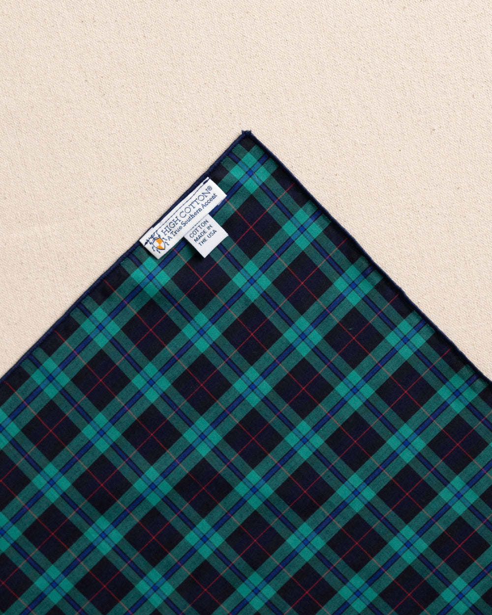 The back detail view of the High Cotton Macleod Tartan Pocket Square at Southern Tide - Blue