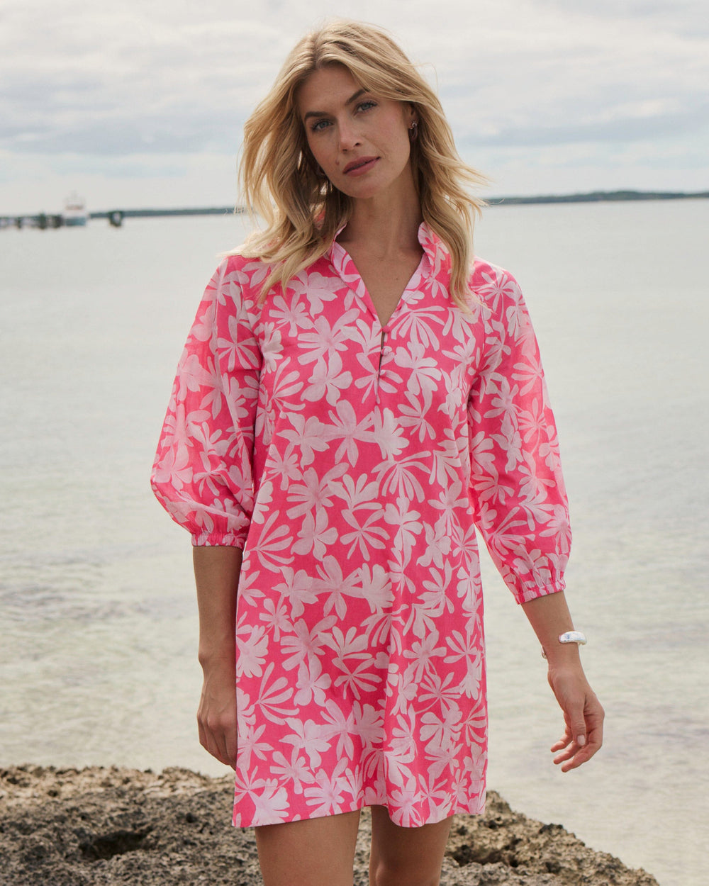 The lifestyle view of the Southern Tide Mandy Bubble Sleeve Dress by Southern Tide - Fandango Pink