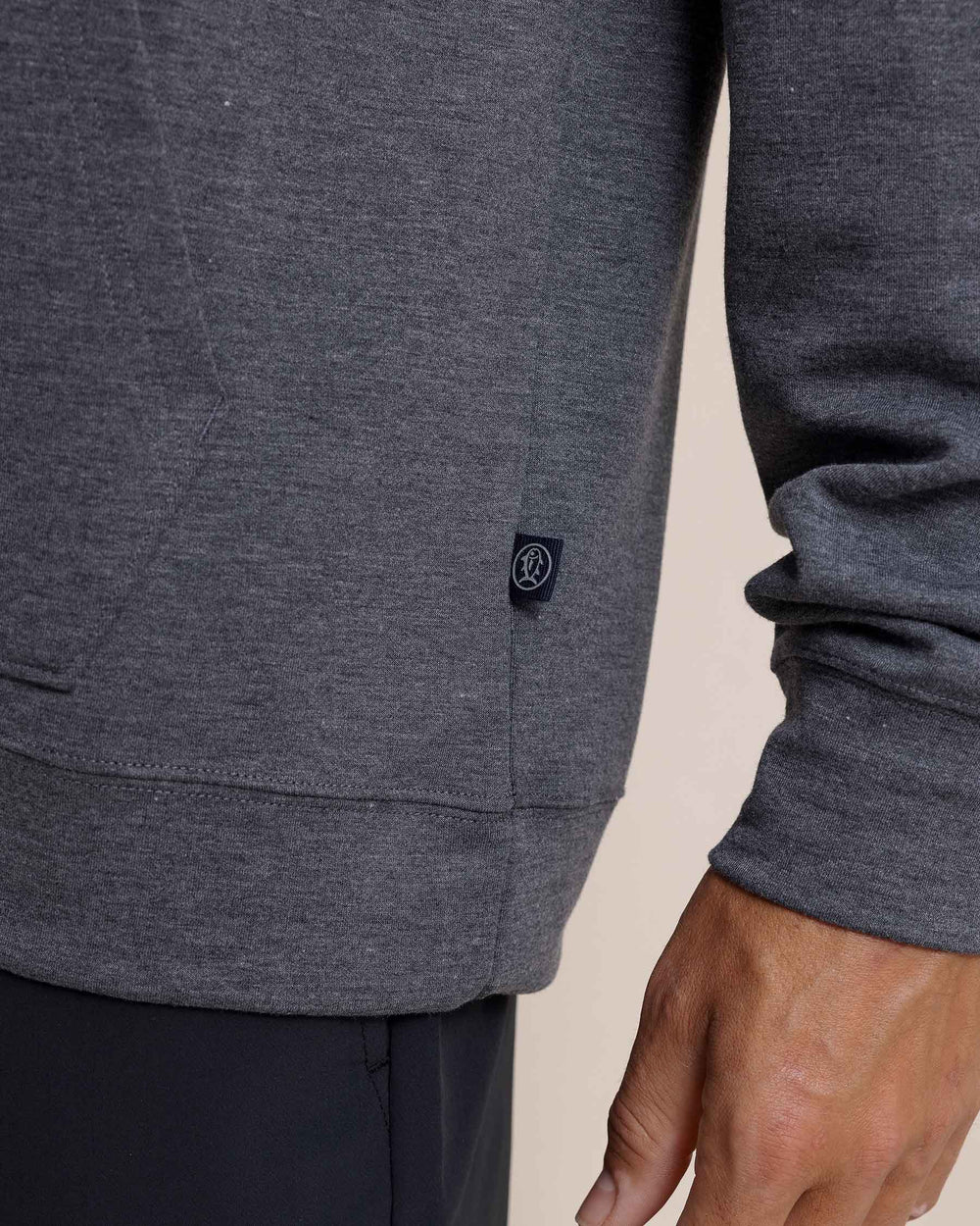 The detail view of the Southern Tide Manteo Heather Interlock Snapfront Hoodie by Southern Tide - Heather Castle Rock