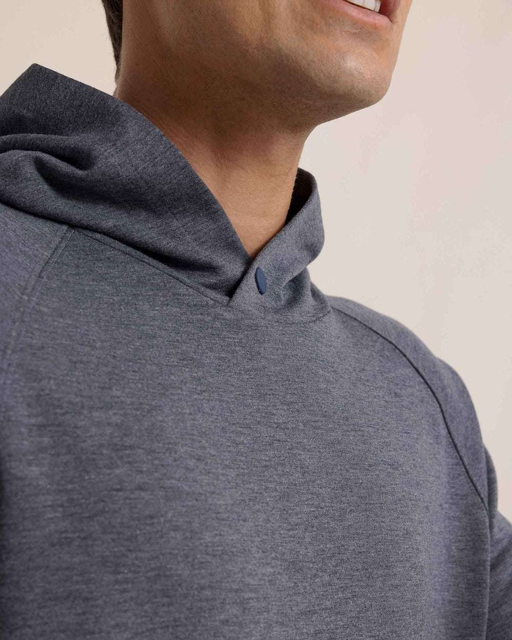 The detail view of the Southern Tide Manteo Heather Interlock Snapfront Hoodie by Southern Tide - Heather Castle Rock