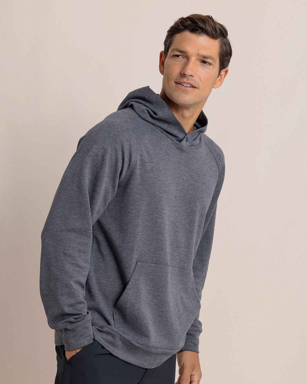 The side view of the Southern Tide Manteo Heather Interlock Snapfront Hoodie by Southern Tide - Heather Castle Rock