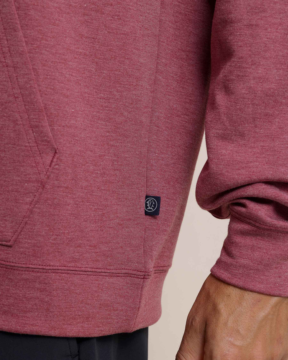 The detail view of the Southern Tide Manteo Heather Interlock Snapfront Hoodie by Southern Tide - Heather Muscadine