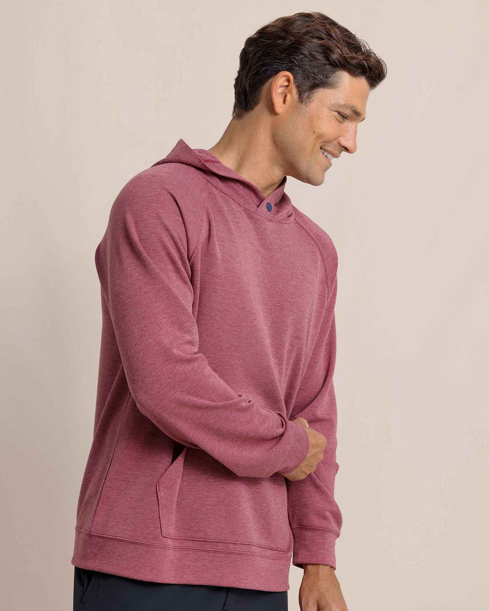 The side view of the Southern Tide Manteo Heather Interlock Snapfront Hoodie by Southern Tide - Heather Muscadine