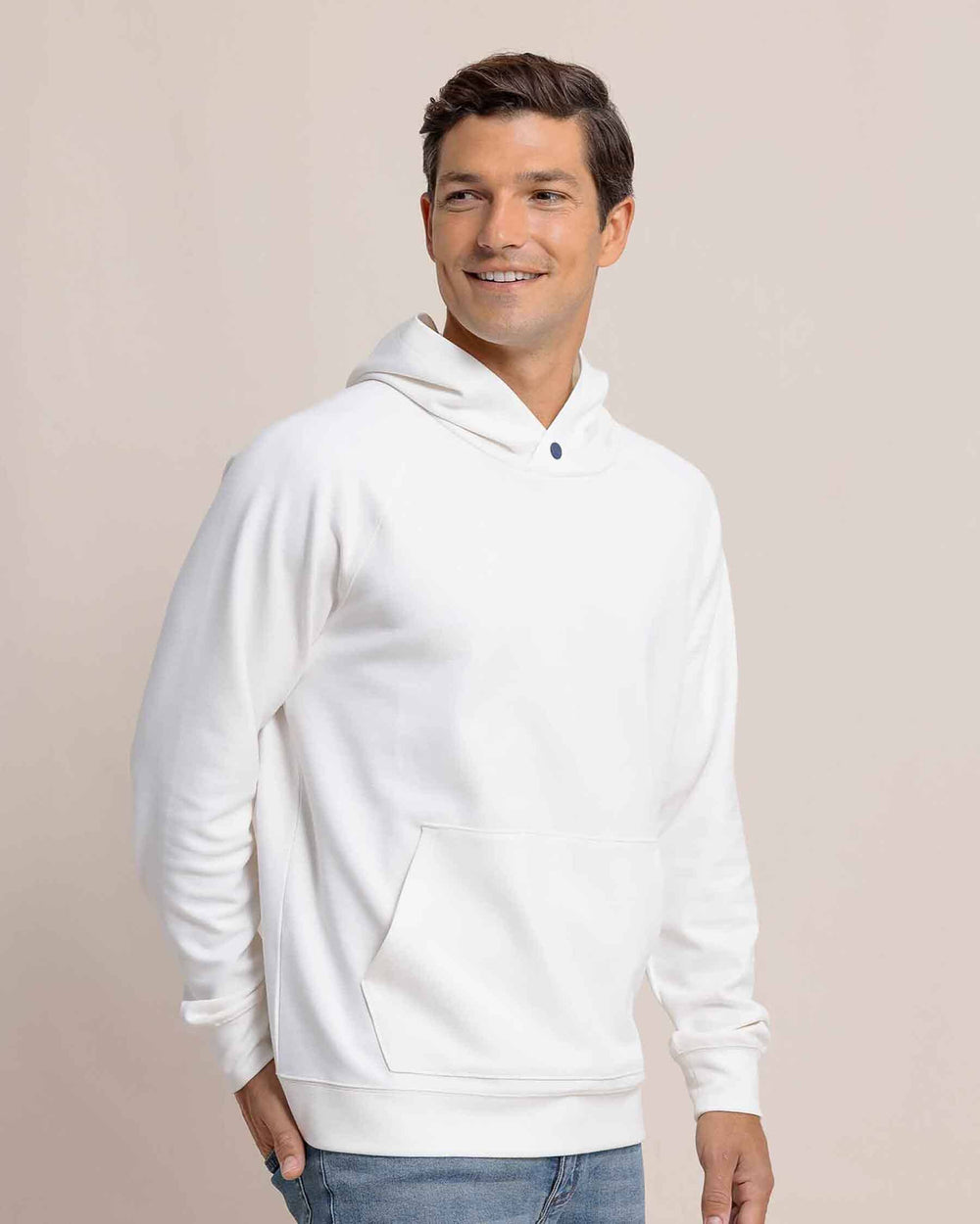 The side view of the Southern Tide Manteo Heather Interlock Snapfront Hoodie by Southern Tide - Heather Sand White