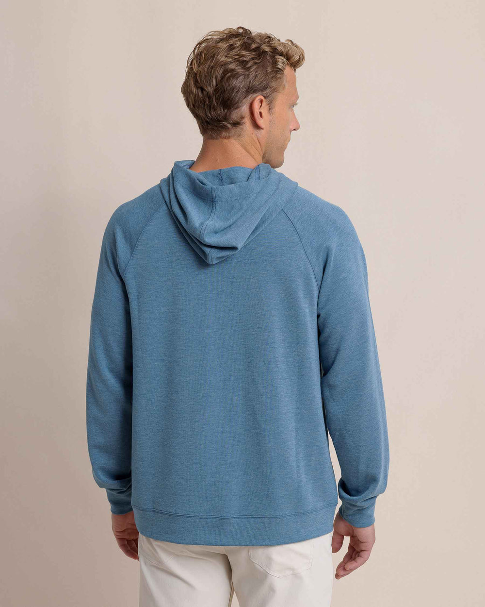 The back view of the Southern Tide Manteo Heather Interlock Snapfront Hoodie by Southern Tide - Heather Teal Haze