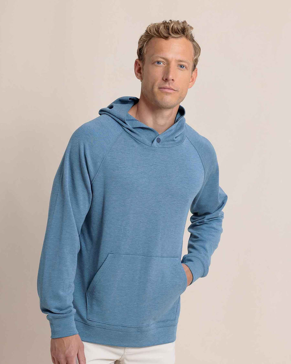 The front view of the Southern Tide Manteo Heather Interlock Snapfront Hoodie by Southern Tide - Heather Teal Haze