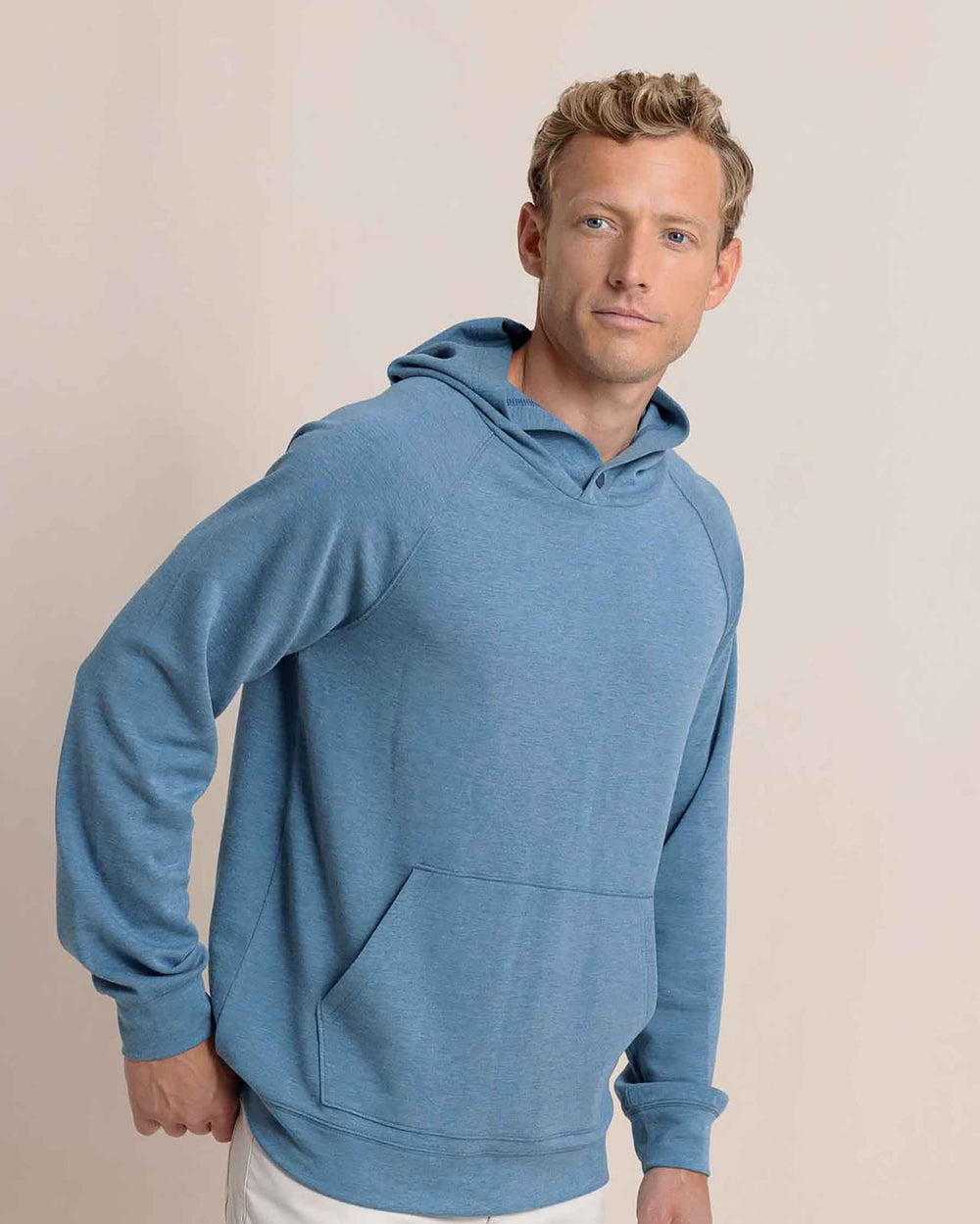 The side view of the Southern Tide Manteo Heather Interlock Snapfront Hoodie by Southern Tide - Heather Teal Haze