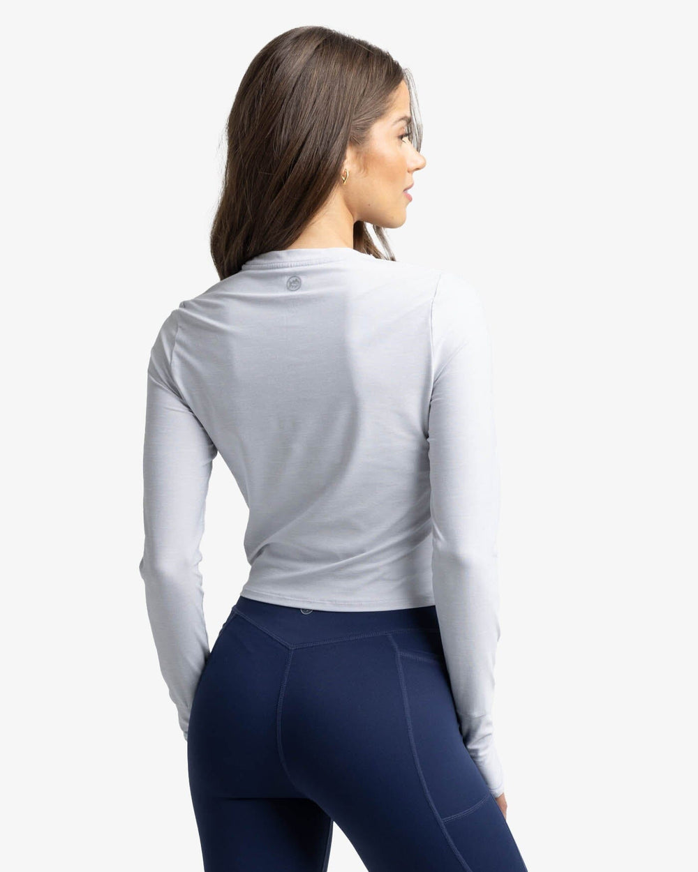 The back view of the Southern Tide Margot brrr°-illiant Twist Knot Top by Southern Tide - Platinum Grey