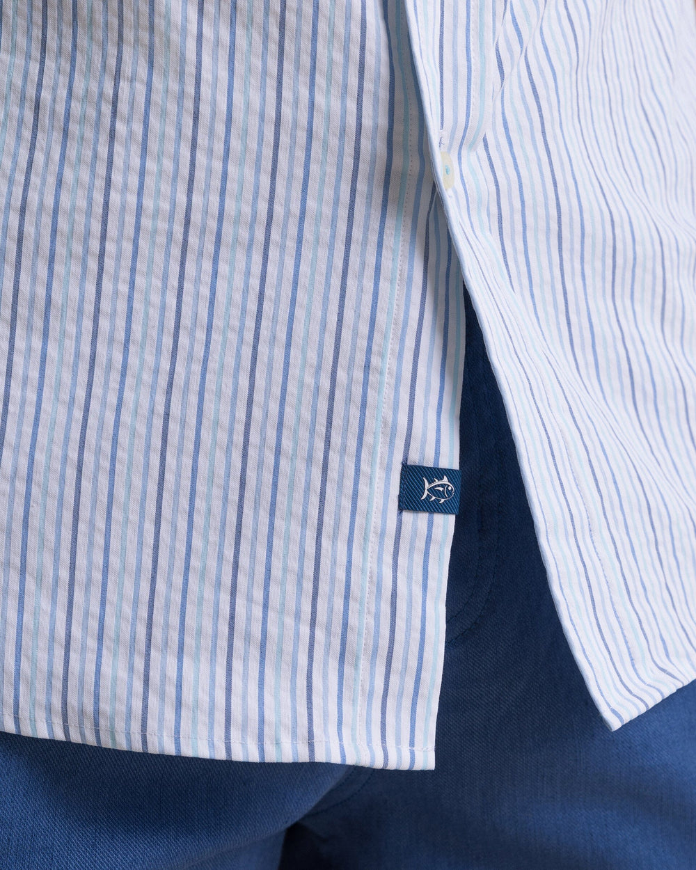 The detail view of the Southern Tide Marina Seersucker Coastal Breeze® Short Sleeve Sport Shirt by Southern Tide - Tropical Breeze Blue