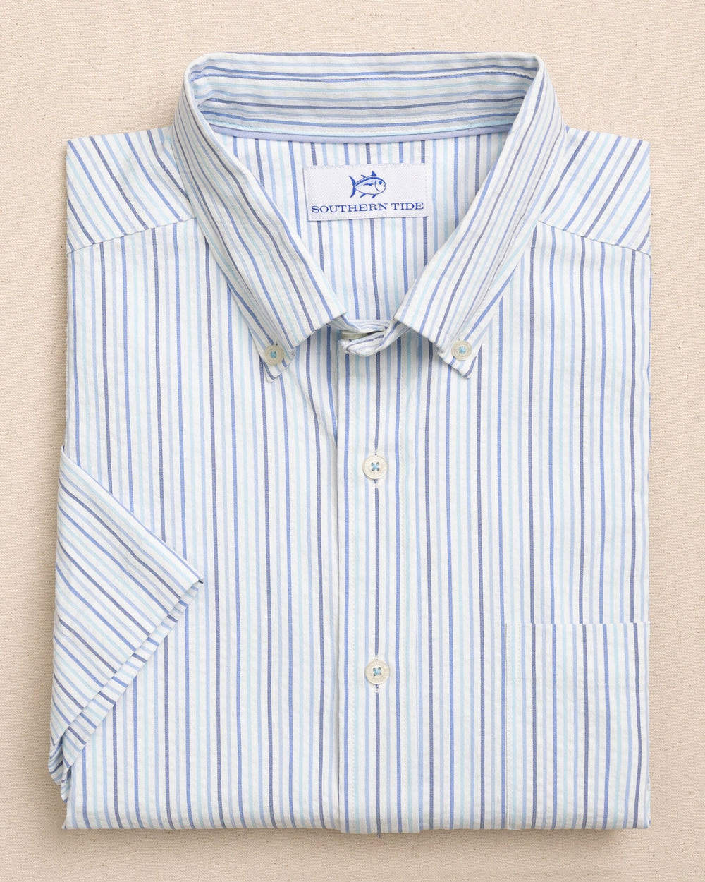 The front view of the Southern Tide Marina Seersucker Coastal Breeze® Short Sleeve Sport Shirt by Southern Tide - Tropical Breeze Blue
