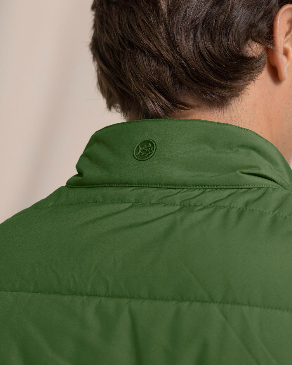 The detail view of the Southern Tide Marsh Creek Cove Quilted Vest by Southern Tide - Cedar Green