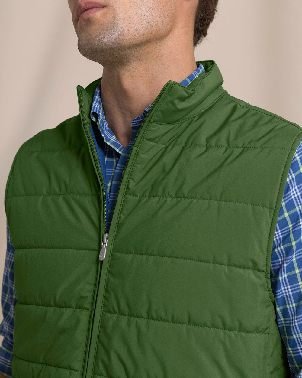 The detail view of the Southern Tide Marsh Creek Cove Quilted Vest by Southern Tide - Cedar Green