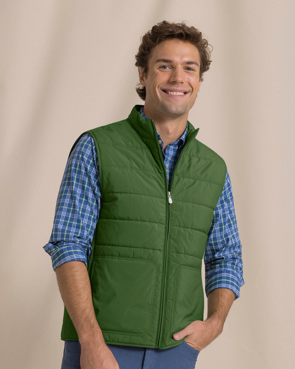 The front view of the Southern Tide Marsh Creek Cove Quilted Vest by Southern Tide - Cedar Green