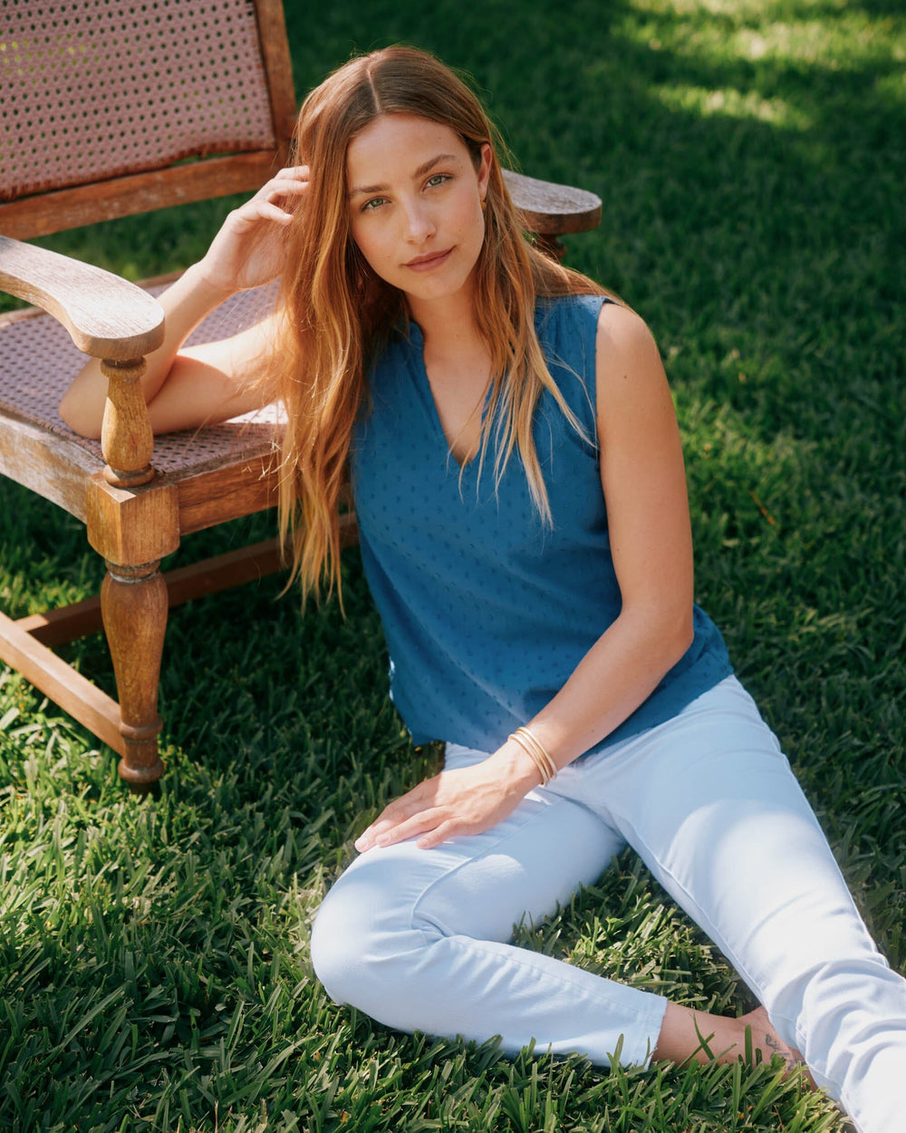 The lifestyle view of the Southern Tide Mary Catherine Swiss Dot Top by Southern Tide - Seven Seas Blue