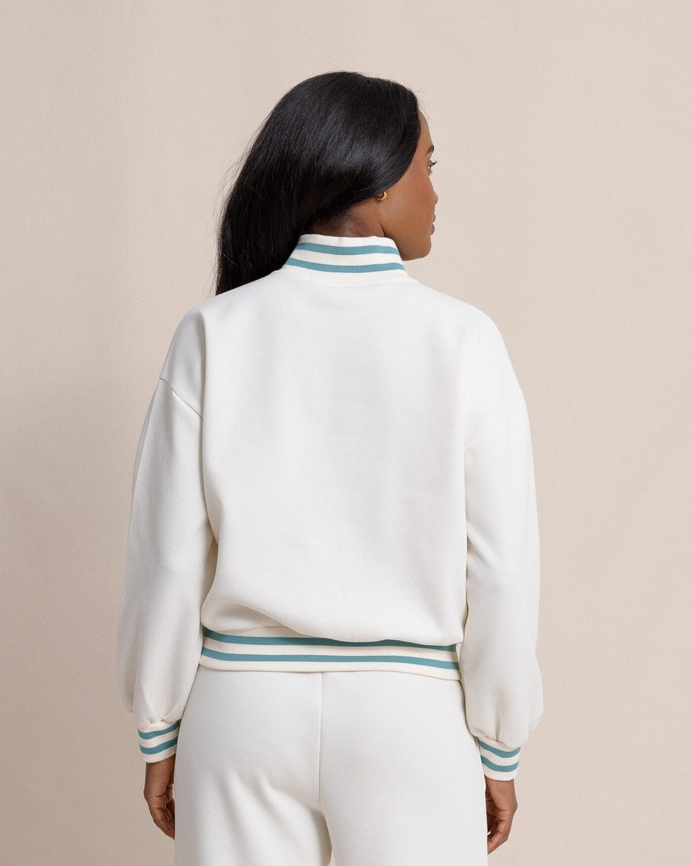 The back view of the Southern Tide Mercy Luxe Lounge Half Zip Pullover by Southern Tide - Sand White