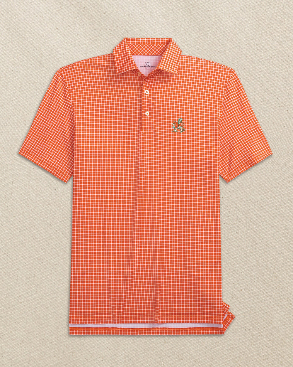 The front view of the Southern Tide Miami Sebastian the Ibis Driver Dunes Edge Plaid Polo by Southern Tide - Endzone Orange
