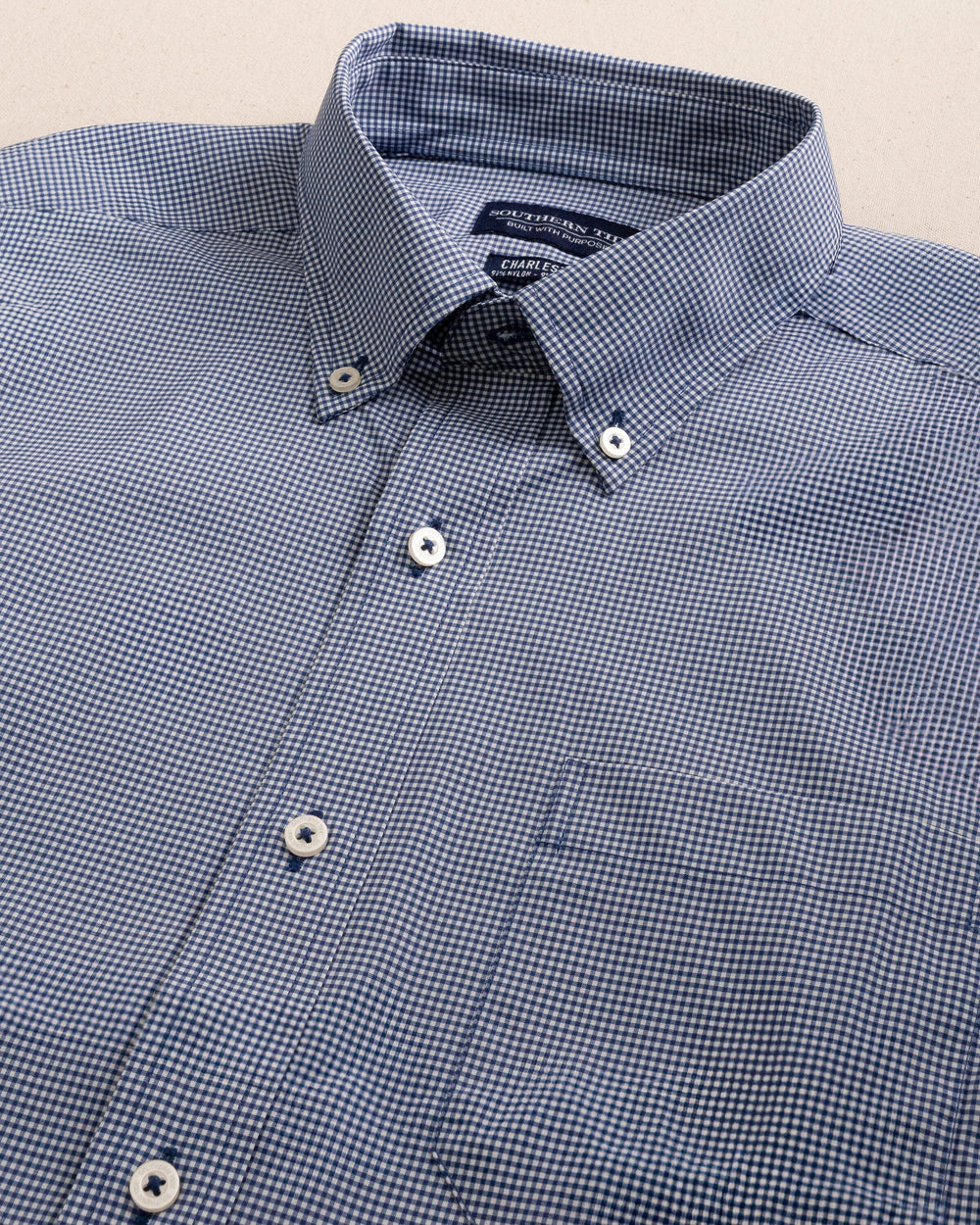 The detail view of the Southern Tide Micro Gingham brrr°® Intercoastal Sport Shirt by Southern Tide - Seven Seas Blue