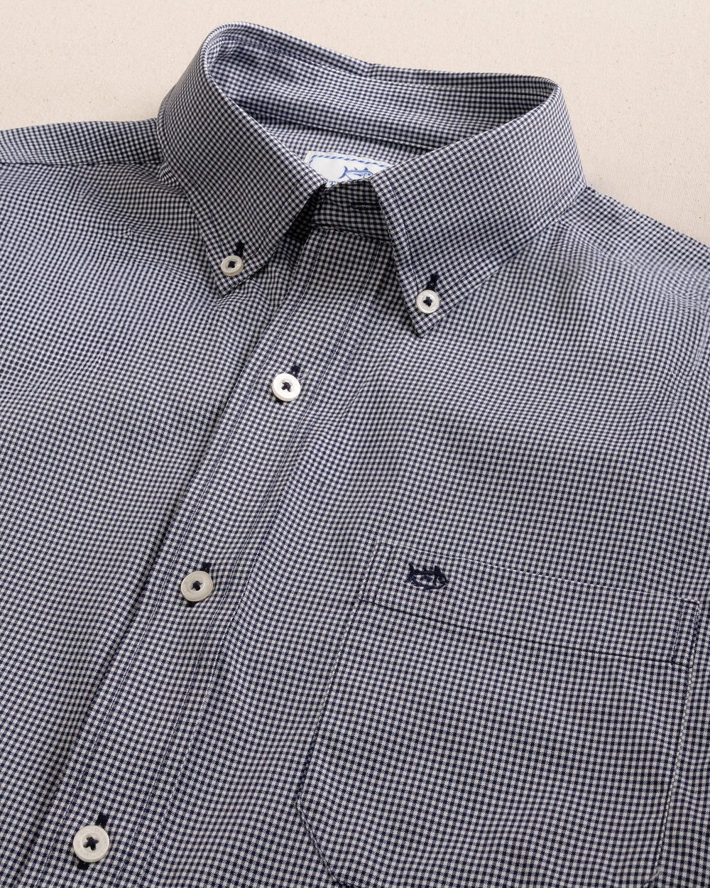 The detail view of the Southern Tide Micro Gingham Intercoastal Performance Sport Shirt by Southern Tide - True Navy