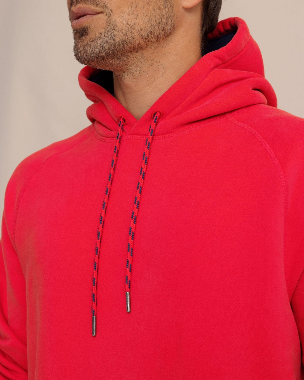 The detail view of the Southern Tide Millview Fleece Hoodie by Southern Tide - Crab Red
