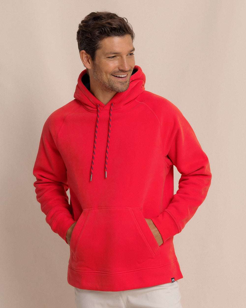 The front view of the Southern Tide Millview Fleece Hoodie by Southern Tide - Crab Red