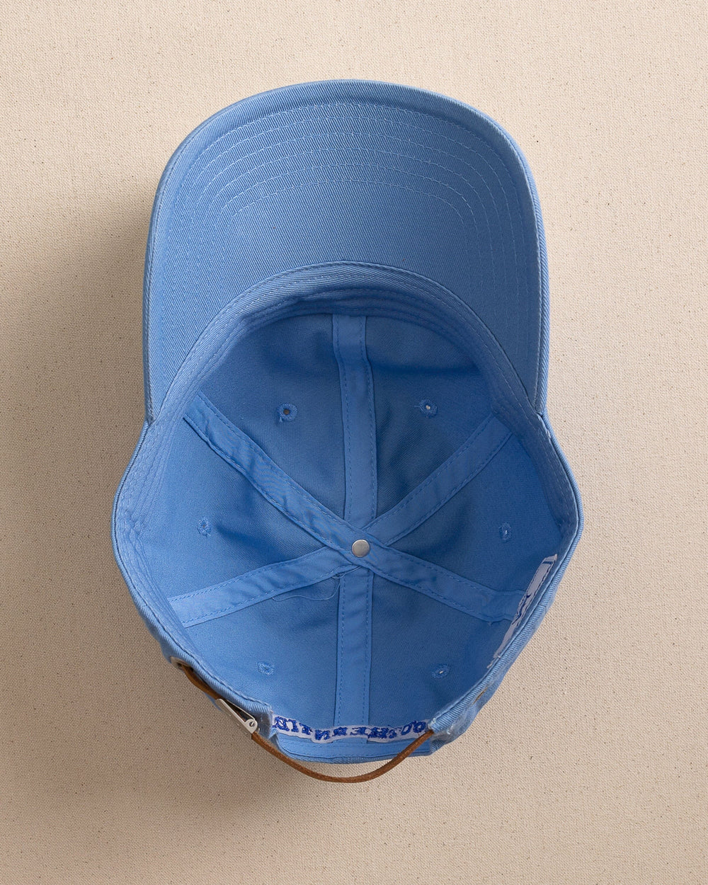 The under view of the Southern Tide Mini Skipjack Leather Strap Hat by Southern Tide - Ocean Channel