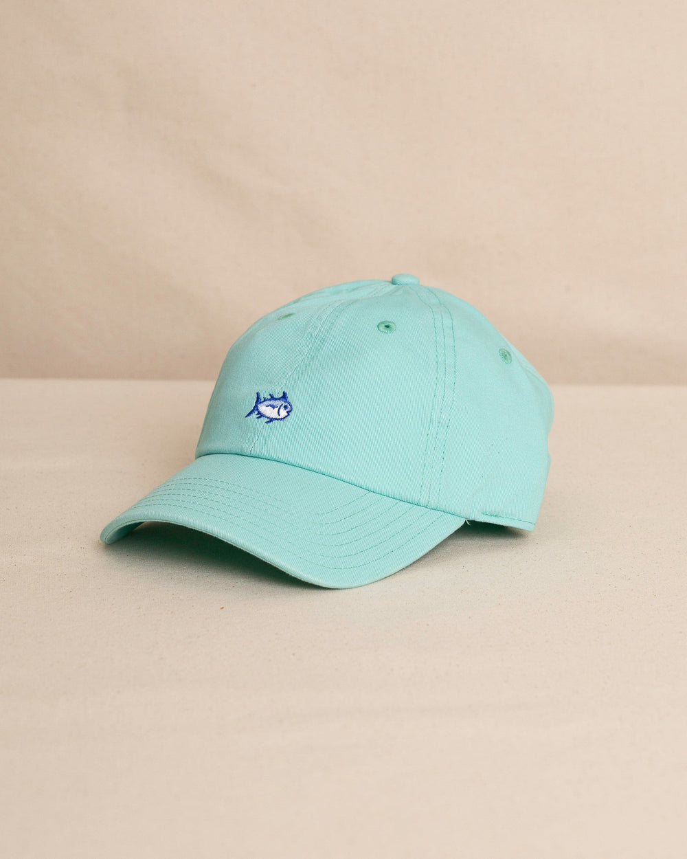 The front view of the Southern Tide Mini Skipjack Leather Strap Hat by Southern Tide - Turtle Green
