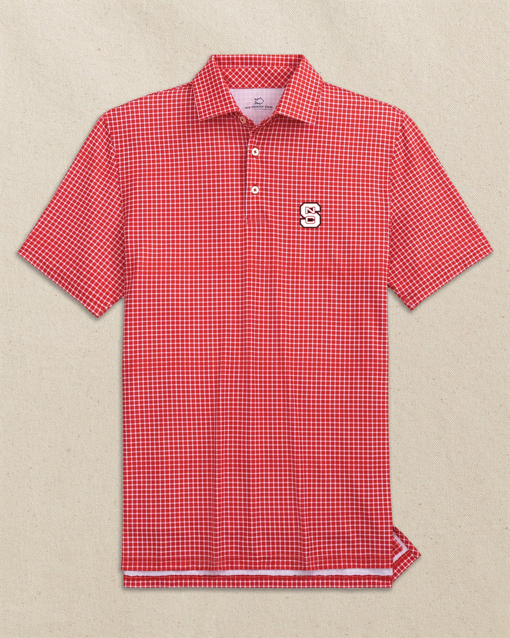 The front view of the Southern Tide NC State Wolfpack Driver Dunes Edge Plaid Polo by Southern Tide - Varsity Red