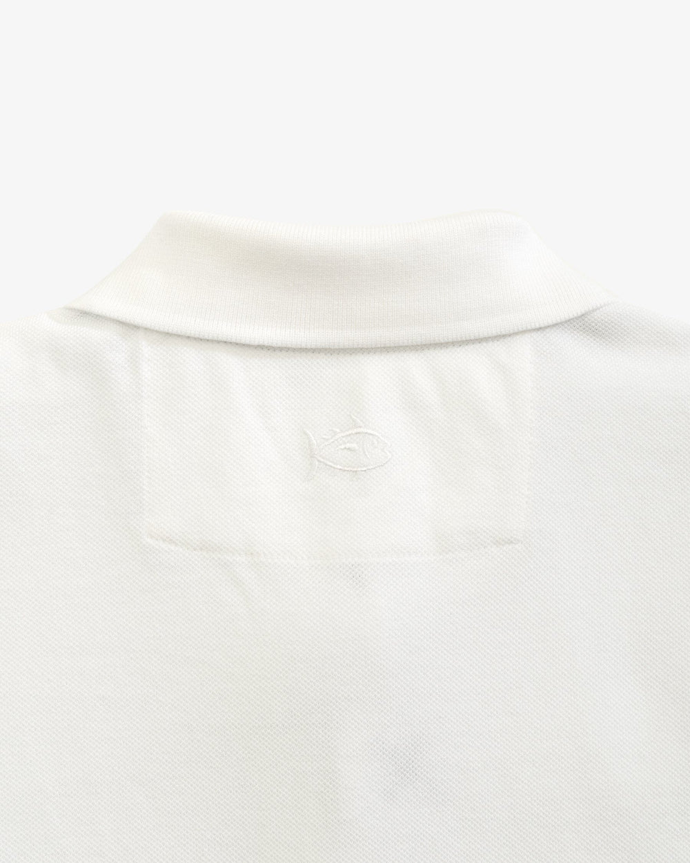 The yoke view of the East Carolina Pirates Skipjack Polo by Southern Tide - Classic White