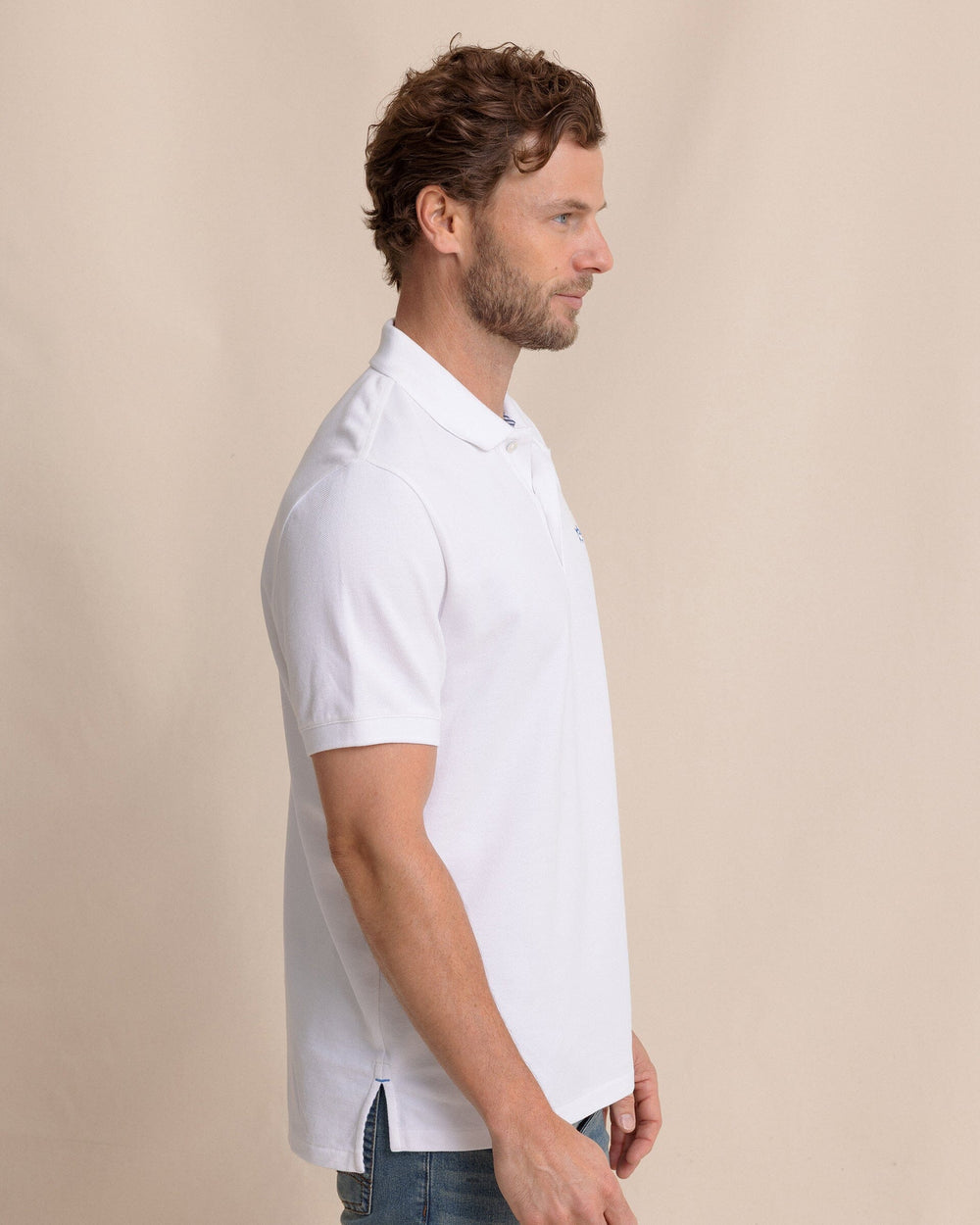 The side view of the Southern Tide Skipjack Polo Shirt by Southern Tide - Classic White