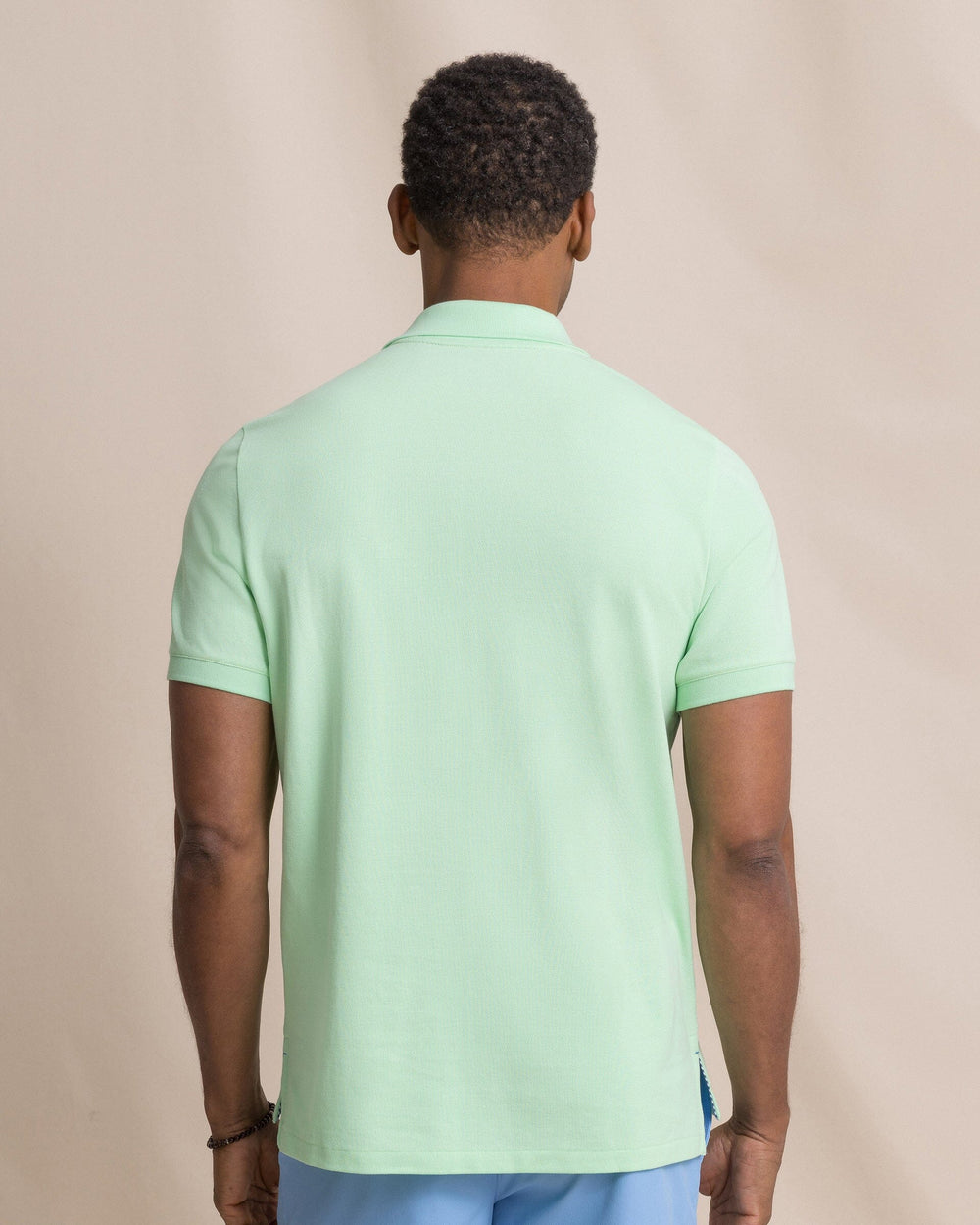 The back view of the Southern Tide Skipjack Polo Shirt by Southern Tide - Green Ash