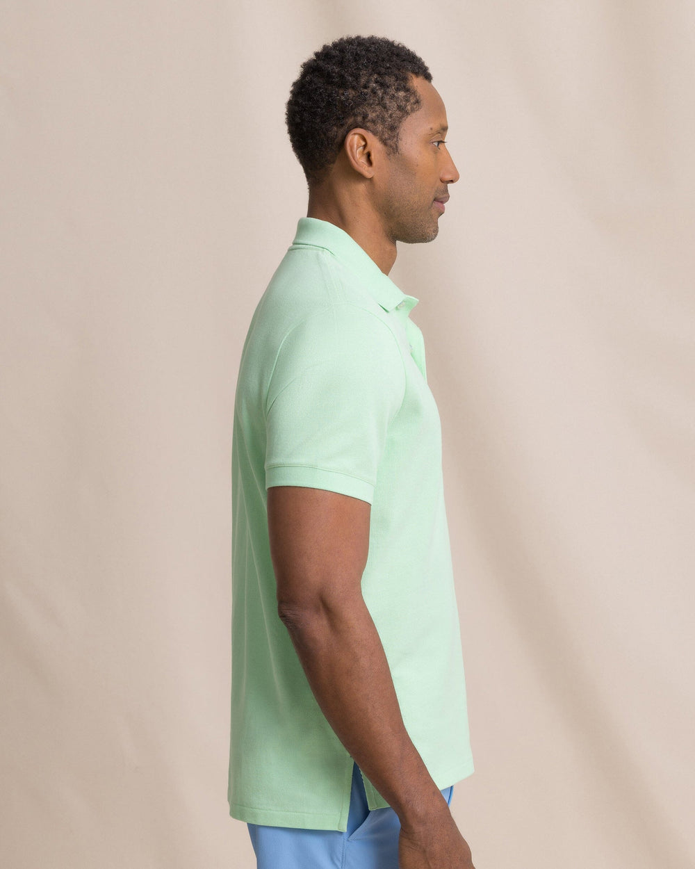 The side view of the Southern Tide Skipjack Polo Shirt by Southern Tide - Green Ash