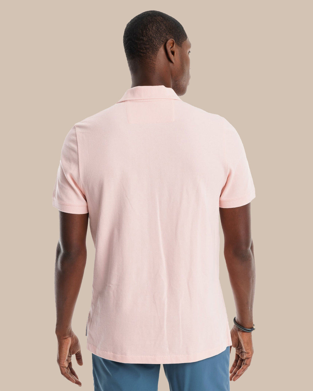 The back view of the Southern Tide Skipjack Polo Shirt by Southern Tide - Light Pink