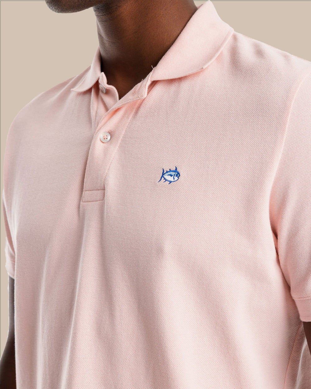 The detail view of the Southern Tide Skipjack Polo Shirt by Southern Tide - Light Pink