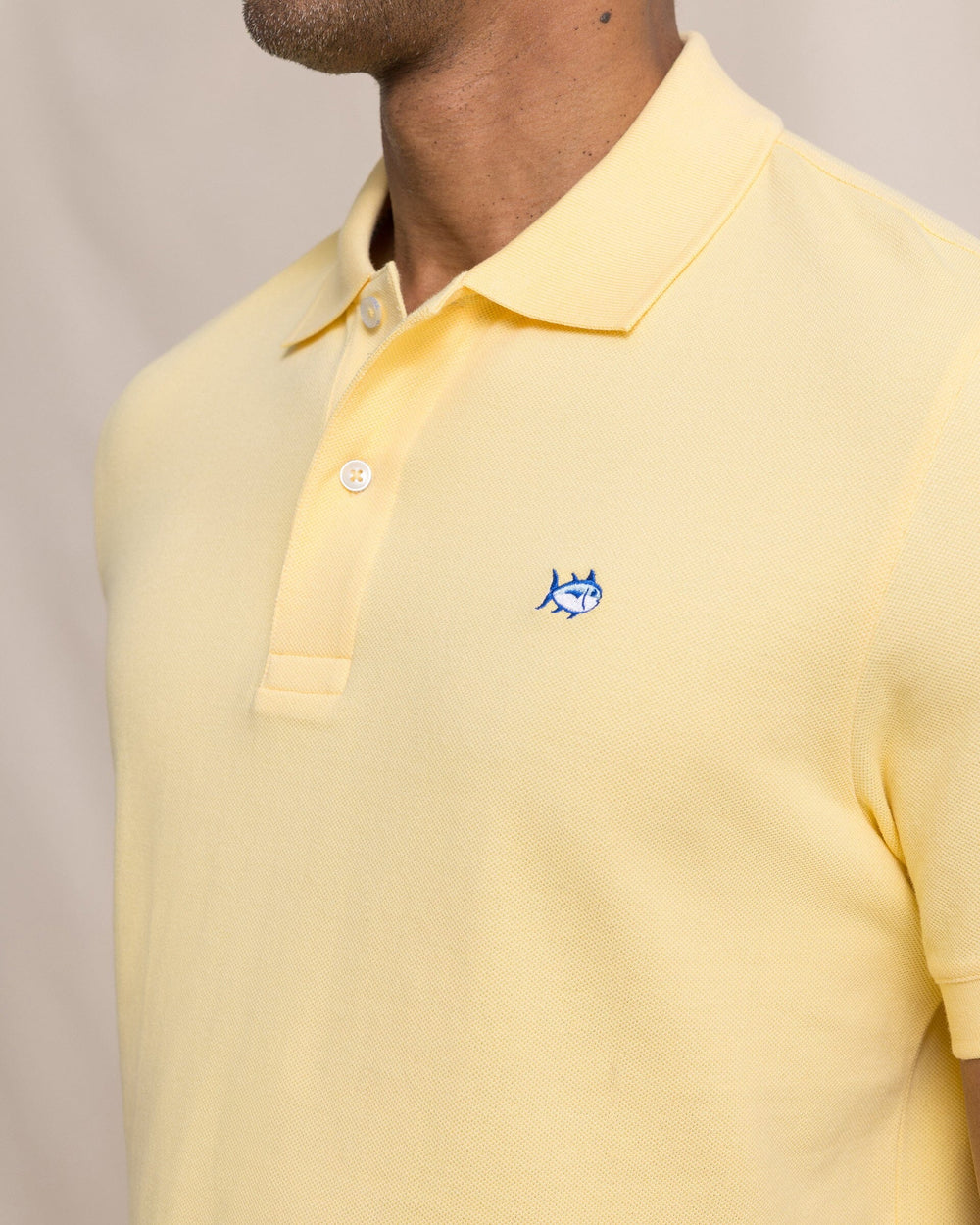 The detail view of the Southern Tide Skipjack Polo Shirt by Southern Tide - Pineapple