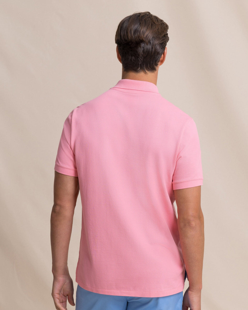 The back view of the Southern Tide Skipjack Polo Shirt by Southern Tide - Sea Pink