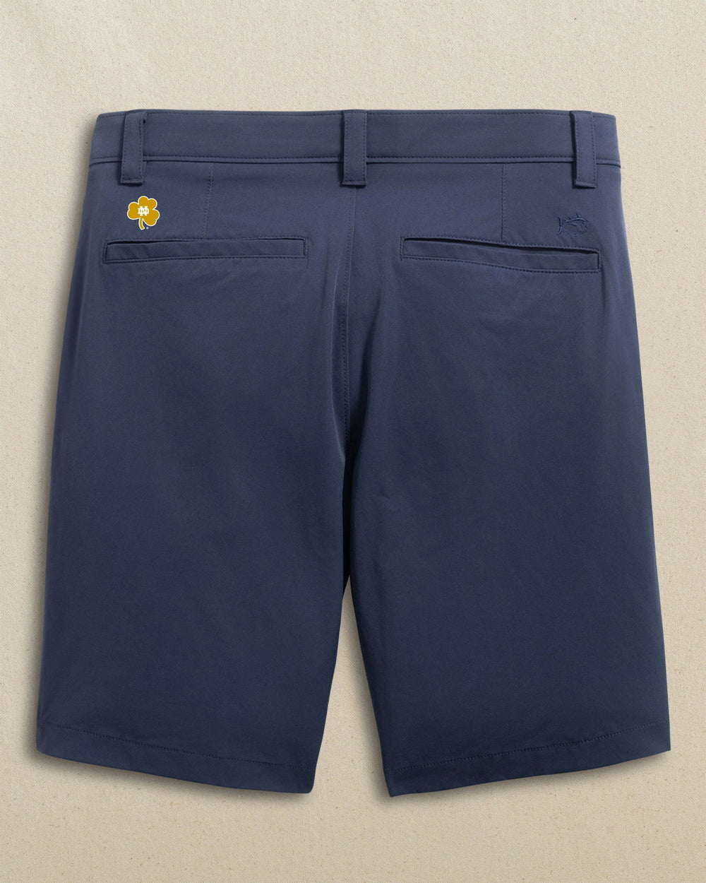The back view of the Southern Tide Notre Dame Fighting Irish Birdie 8" Coastal Breeze® Performance Short by Southern Tide - True Navy