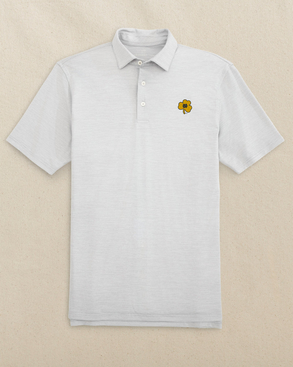 The front view of the Southern Tide Notre Dame Shamrock Driver Spacedye Polo by Southern Tide - Slate Grey