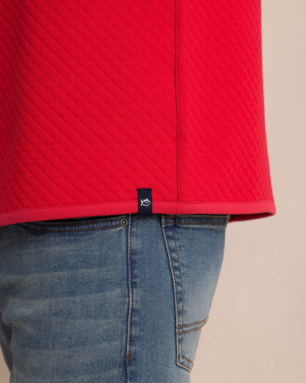 The detail view of the Southern Tide Oak Island Reversible Quarter Zip by Southern Tide - Grenadine Red